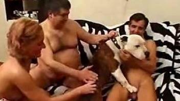 Gay men share a dog cock in their fantasy porn play at home