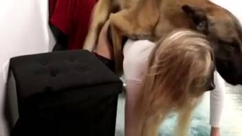 Blonde in leather skirt being slammed by a hot canine