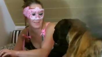 Aroused naked lady mixes self-pleasure with bestiality