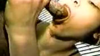 Woman gives oral sex to a dog and takes its cum in her mouth