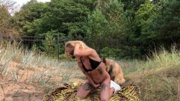 Sexy blonde babe flaunts her curves on the shore before getting intimate